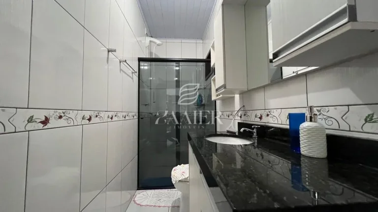Imagem Terreno com Duas Casas Térreas – Oportunidade para Investir ou Morar Bem