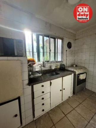 Imagem Casa com 4 dormitórios à venda - 347 m² por R$ 1.100.000 - Vila Matias - Santos/SP
