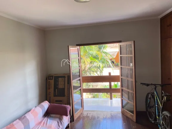 Imagem Esta encantadora residência oferece um espaço amplo e confortável, com quatro dormitórios, sendo...