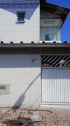 Imagem Estilo e Funcionalidade – Sobrado em Região Privilegiada de Praia Grande