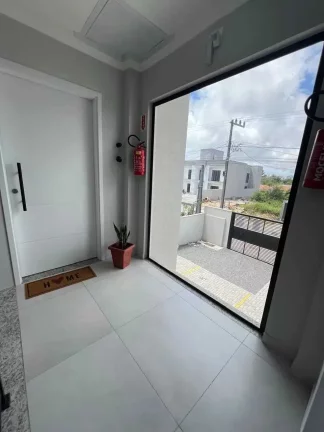 Imagem Geminado com 3 dormitórios sendo 1 suíte, sacada com churrasqueira e 1 vaga em Barra Velha