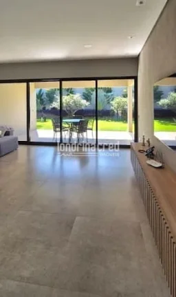 Imagem Sobrado de alto padrão em Cambé: 3 suítes, piscina aquecida, casa de visitas, pomar, energia solar e 3.000m² de terreno amplo