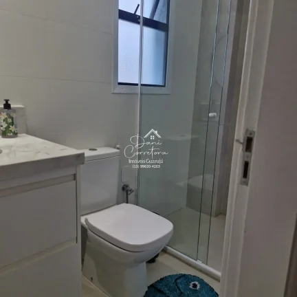 Imagem Apartamento reformado em Guarujá-SP, Jardim Astúrias: 2 quartos, 1 suíte, 2 salas, 2 banheiros, 1 vaga de garagem, 62,25 m²