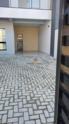 Imagem Sobrado de alto padrão, pronto para morar no bairro Meia Praia em Navegantes a venda com Adriano Carpes Imóveis