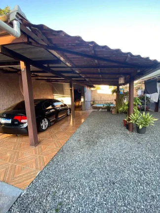 Imagem Casa com 4 dormitórios sendo 1 suíte e 4 vagas de garagem em Jarivatuba | Joinville/SC