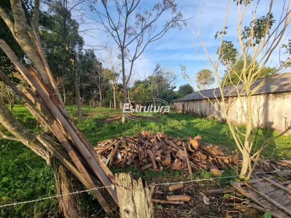 Imagem Chácara com 3 residências a poucos metros da cidade