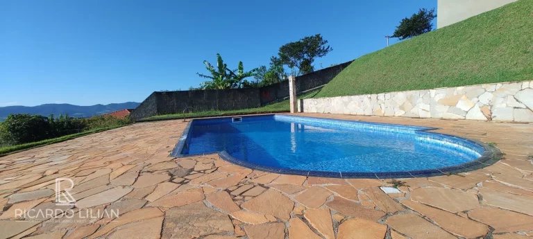 Imagem "Espetacular Casa em Condomínio Fechado: 4 Suítes, Área Gourmet, Piscina e Vista Inigualável!"