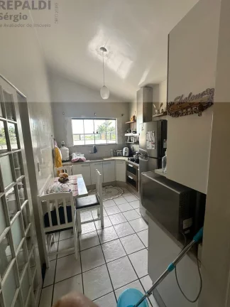 Imagem Imperdível Casa à venda em Criciúma-SC, Bairro Mina Brasil: 4 quartos, 1 suíte, 3 salas, 4 banheiros, 3 vagas, 220m2!