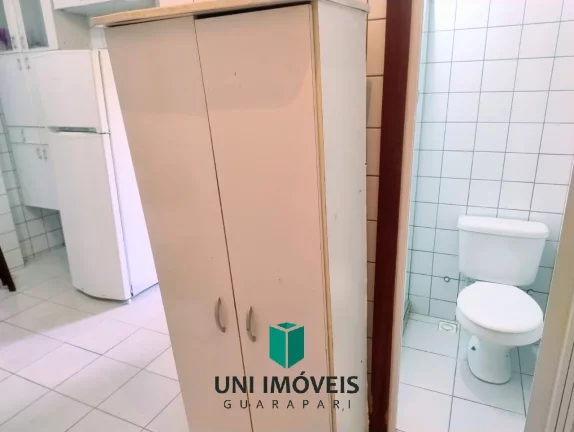 Imagem Oportunidade no Centro de Guarapari: Apartamento Amplo com 2 Quartos + Quarto Reversível e garagem