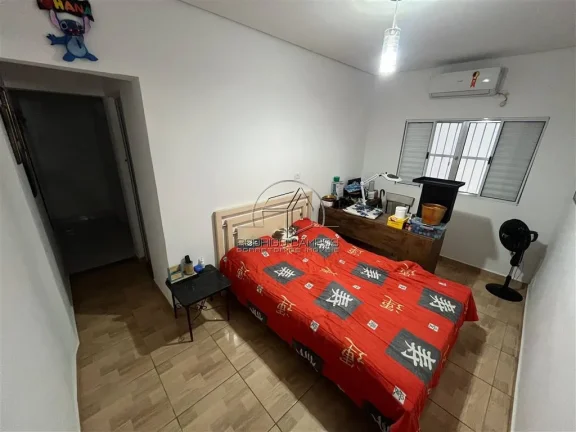 Imagem Casa Geminada Térrea com Piscina e 3 Quartos no Tupi, Praia Grande
