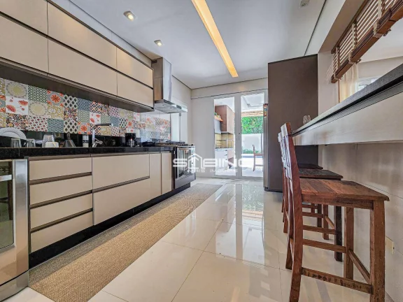 Imagem Belíssima casa à venda na Riviera de São Lourenço - Bertioga SP | 5 Dormitórios | 5 Suítes | 390 m² de área útil.