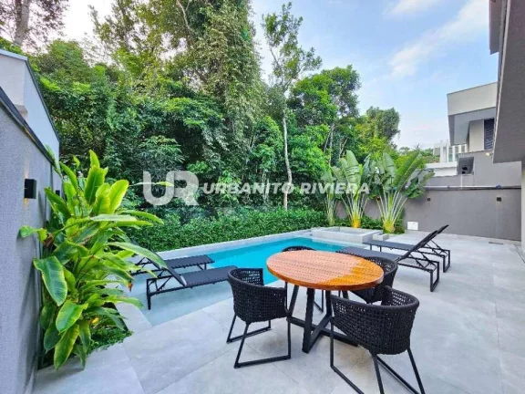 Imagem Casa no Módulo 11 da Riviera com 6 suítes, piscina, jacuzzi e praça de fogo integrada à natureza