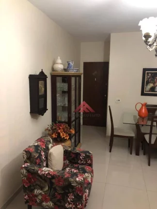 Imagem Amplo Apartamento na segunda quadra da Ary Parreiras,composto de ampla sala,dois quartos,cozinha,area de serviço externa e dependências completa,vaga