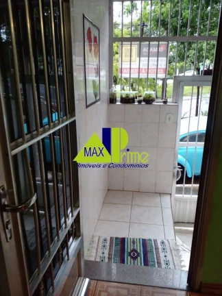 Imagem Ampla casa à venda em São Paulo-SP: 5 quartos, 1 suíte, 3 salas, 2 vagas, 210m² na Vila Buenos Aires!