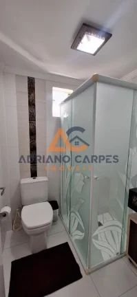 Imagem Apartamento mobiliado com 1 suíte mais 1 dormitório e demais cômodos na quadra mar na praia de Gravatá em Navegantes a venda com a Imobiliária Adriano Carpes