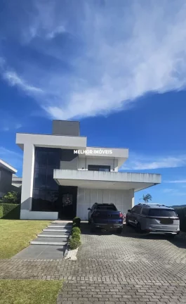 Imagem Casa em condomínio fechado mobiliada e equipada com 4 suítes localizada em Camboriú.
