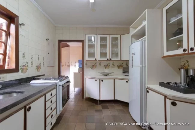 Imagem Casa com 7 dorms (5 suítes) à venda, 500 m² por R$ 3.900.000 - Granja Viana - SP