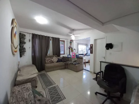 Imagem Village triplex com 2 suítes e 2 vagas à venda, 105 m² por R$ 484.000 - Macuco - Santos/SP