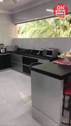 Imagem Belissímo Sobrado com 3 dormitórios à venda, 500 m² por R$ 2.850.000 - Jardim Virginia - Guarujá/SP