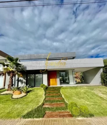 Imagem Casa térrea em condomínio fechado com 04 suites