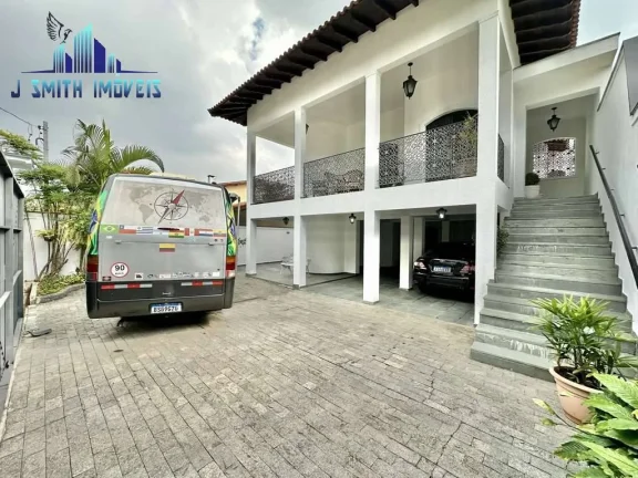 Imagem Casa 4 suítes, salão, escritório, adega, 7vagas (4 cobertas).Granja Vianna.