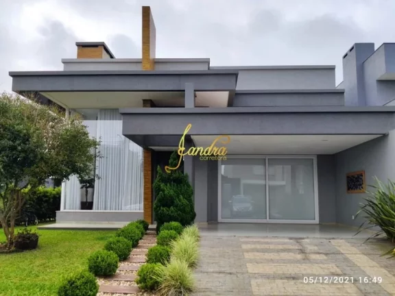 Imagem Excelente Casa no Condomínio Capão Ilhas! Estilo Contemporânea, mobiliada e decorada, composta por 03 suítes