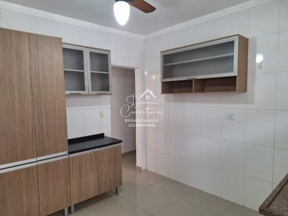 Imagem Imperdível oportunidade, apartamento de 2 quartos sem mobília na rua mais desejada do Guarujá-SP - 65m² - 1 vaga de garagem