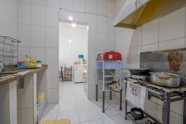 Imagem Casa com 3 suítes e 2 vagas de garagem no Centro de Balneário Camboriú.