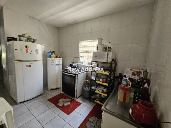 Imagem Casa 2 quartos à venda em Enseada de Jacaraípe, murada e gradeada, ideal para quem busca praticidade e quintal.