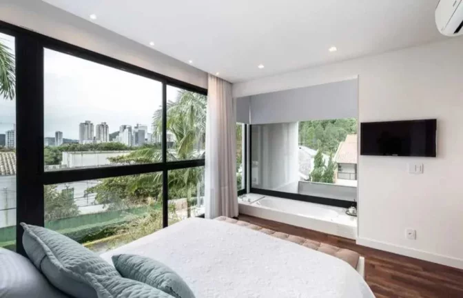Imagem Casa moderna com 3 dormitórios sendo 1 suíte e 2 demi e 2 vagas, Ariribá - Balneário Camboriú/SC