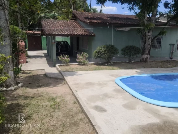 Imagem Casa de esquina em Caragua com 3 dormitorios e piscina a venda.