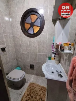 Imagem Casa com 4 dormitórios à venda - 347 m² por R$ 1.100.000 - Vila Matias - Santos/SP