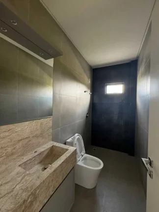 Imagem Casa em condomínio com 4 dormitórios e 4 vagas de garagem em Camboriú