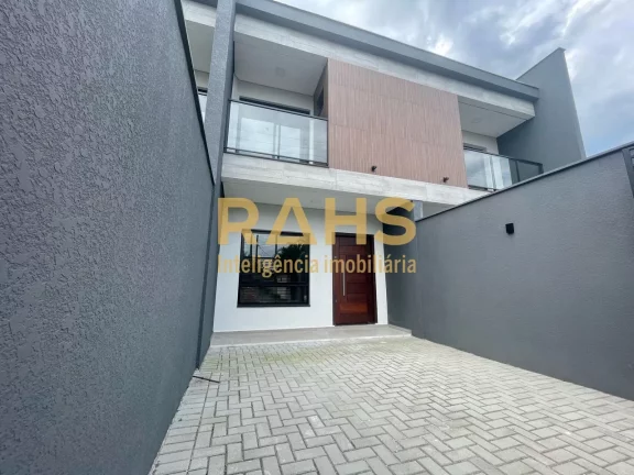 Imagem Ótimo sobrado geminado com 1 suíte mais 2 quartos a venda no bairro Bom Retiro em Joinville. Conta...