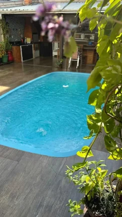 Imagem Casa com 3 suítes e 4 vagas de garagem em Balneário Camboriú/SC