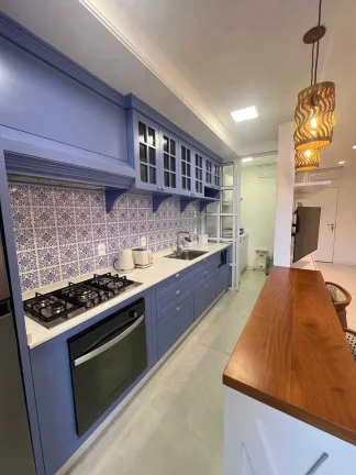 Imagem Apartamento a 250m do mar com 2 dormitórios sendo 2 suítes e 2 vagas de garagem em Bombinhas/SC
