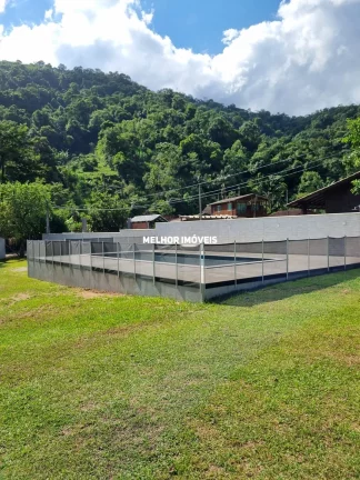 Imagem Chácara á venda com 2 casas, piscina, salão de festa localizada em Camboriú Santa Catarina