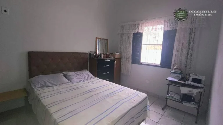 Imagem Casa com 3 dormitórios à venda, 240 m² por R$ 700.000,00 - Caiçara - Praia Grande/SP