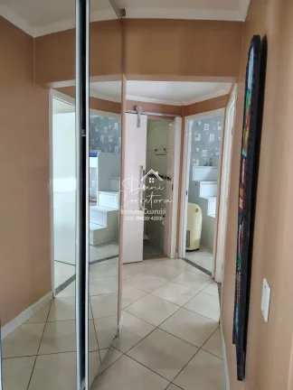 Imagem Apartamento com locação sem garantia frente mar Tombo com lazer: 2 salas, 2 banheiros, 1 vaga de garagem, 78m².