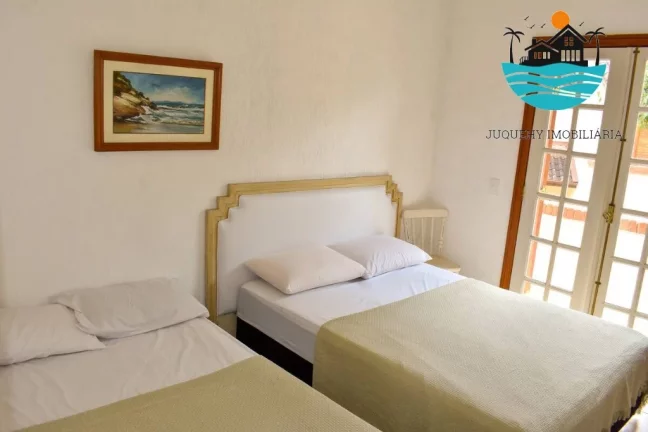 Imagem Casa em condomínio para venda em Juquehy com 3 dormitórios, 1 suíte, 50 metros da praia e 160m² de área construída | Juquehy Imobiliária