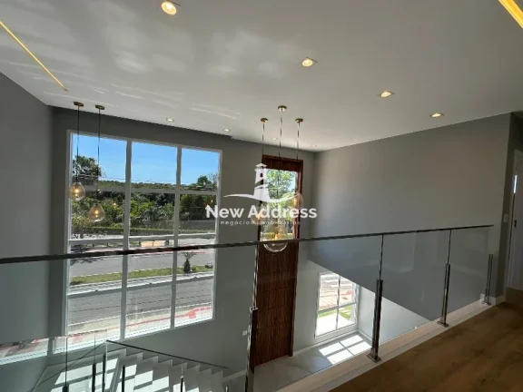 Imagem Casa de 440m², com vista para reserva, piscina e hidromassagem, à venda no Riviera Park - Vila Velha