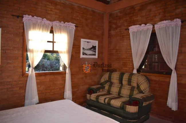 Imagem Casa com 3 dormitórios à venda, 280 m² por R$ 1.220.000 - Alto Do Capivari - Campos do Jordão/SP