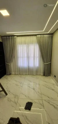 Imagem Casa com 3 dormitórios à venda, 140 m² por R$ 900.000,00 - Maracanã - Praia Grande/SP
