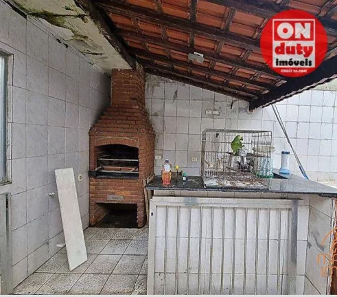 Imagem Casa com 3 dormitórios à venda, 275 m² por R$ 610.000,00 - Bom Retiro - Santos/SP