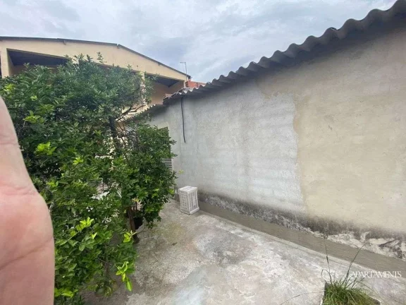 Imagem Terreno com 3 Casas com 3 vagas de carro e moto.
