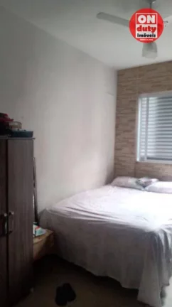 Imagem Apartamento com 2 dormitórios à venda, 64 m² por R$ 220.000,00 - Saboó - Santos/SP