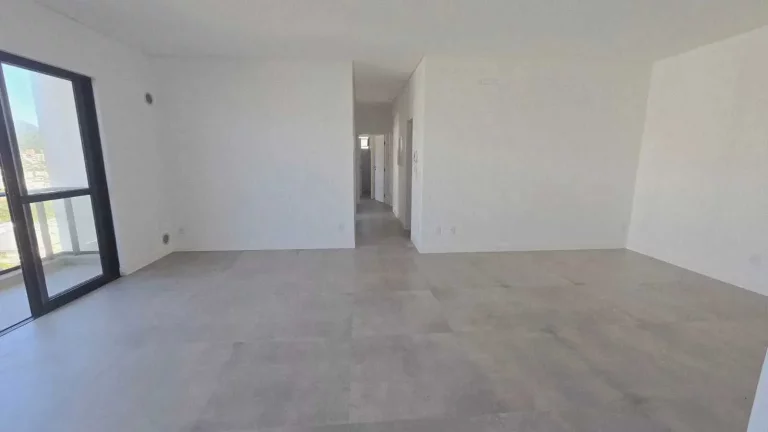 Imagem Apartamento vista mar com 3 suítes e 2 vagas de garagem na Praia Brava