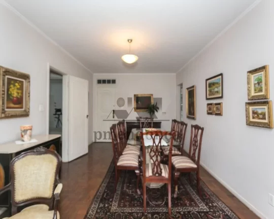 Imagem Apartamento com piso de madeira, living para 2 ambientes, 2 dormitórios sendo 1 suíte, lavabo, coz...