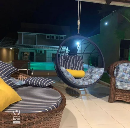 Imagem Casa 480m² com espaço gourmet e piscina, 7 quartos, 5 vagas de garagem à venda por R$ 2.500.000 - Piçarras - Guaratuba/PR