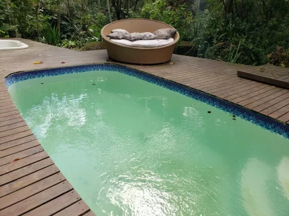 Imagem Viva em um paraíso: casa mobiliada com córrego e árvores frutíferas em Garopaba-SC